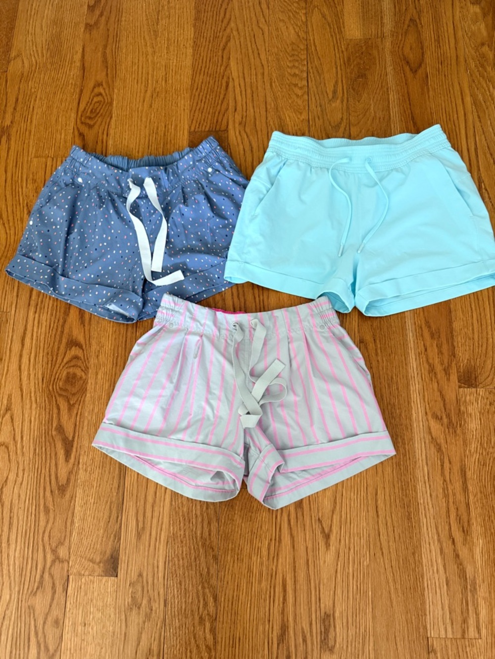 THREE lululemon athletica Women's Blue, Aqua & Pink Stripe Shorts Trio